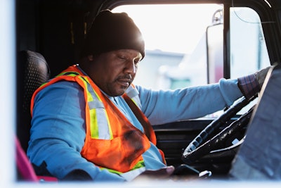 truck driver on his phone