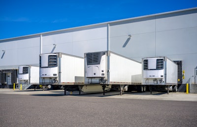 Reefer trailers at a dock