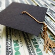 graduation cap and money