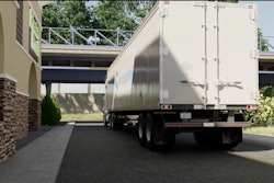 Trucker John Doe assessed the situation and believed he would have enough bridge clearance, though it would be close. Perhaps too close?