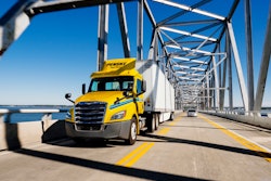penske truck driving on bridge