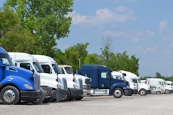 PS Logistics trucks in a parking lot
