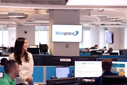 BlueGrace Logistics' employees sitting at their desks