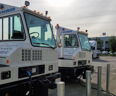 To upgrade their power supply at their Ontario, Calif. location, DHE turned to several partners including Volvo Trucks North America, Southern California Edison, Greenlots, Solar Optimum, ABB, Core States and the City of Ontario. Orange EV yard tractors are shown above.