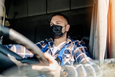 truck driver with a mask