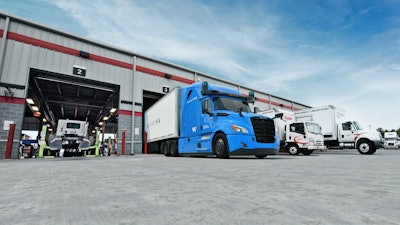 Wayme truck in a maintenance bay