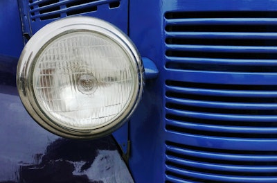 headlamp on a blue semitruck