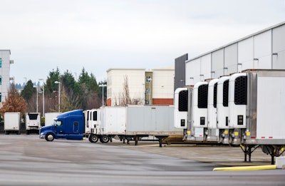 Reefer trailers at a dock