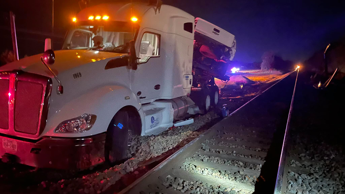 The driver of this 2014 Kenworth T680 exited the truck with his dog before the train struck the rig on Friday evening near Thackersville, Okla.