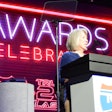 Betty Aragon accepting an award