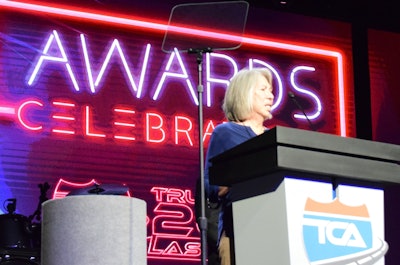 Betty Aragon accepting an award