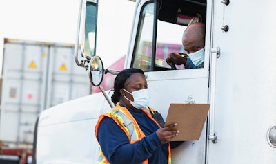 truck driver in a mask