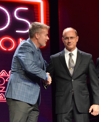 Bryan Smith accepts an award