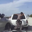 Twenty-three year-old Florida State Trooper Dominic Alexandre is shown in this screenshot dashing out of the way of a pickup that nearly struck him last week in Palm Beach County on Interstate 95.