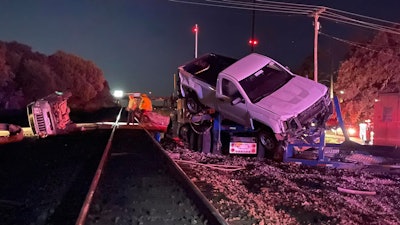 A car hauling rig smashed by a train recently in Oklahoma injured five people and left behind plenty of carnage including a damaged locomotive and a half-mile stretch of track. It was the third truck to become stuck on the tracks near Thackerville that week according to the Oklahoma Highway Patrol.