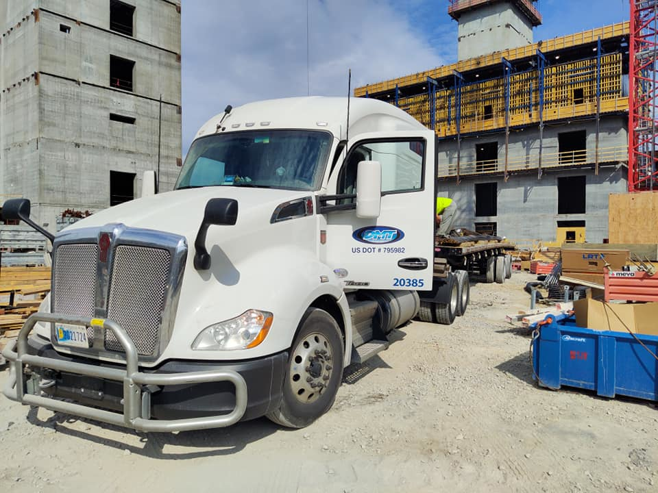 DMT semi-truck on a construction job site