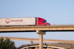 Forward Air semi on a bridge