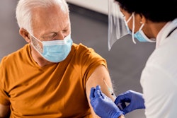 man receiving vaccine shot