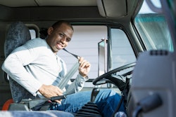 Driver buckling seatbelt