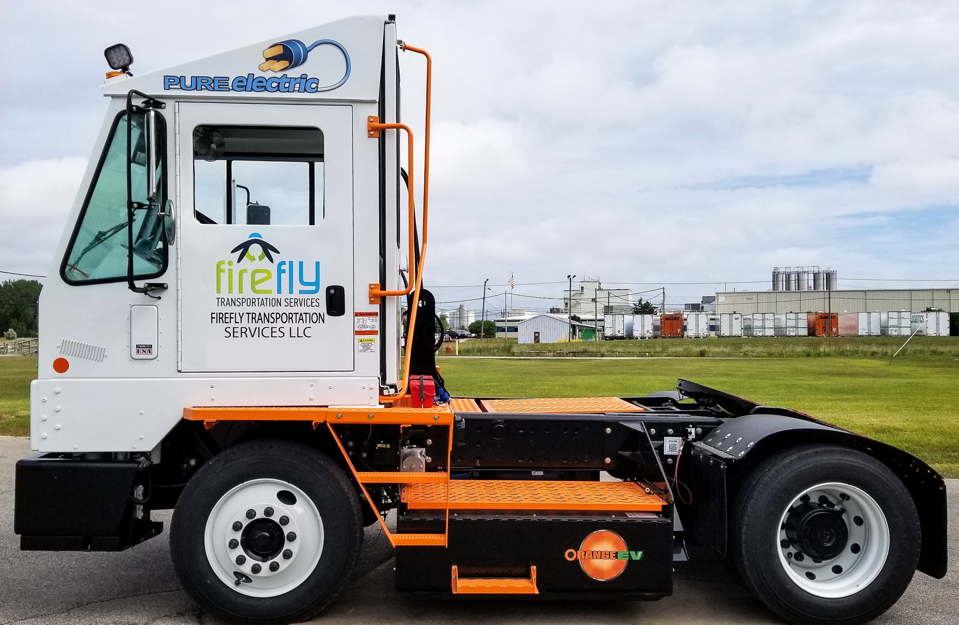Orange EV terminal tractor