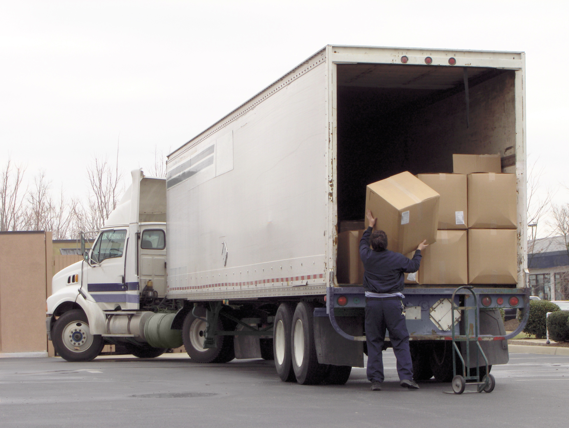man unloading a truck