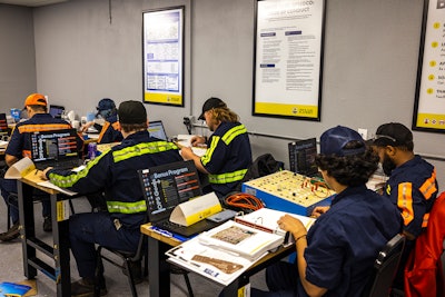 Love's technicians in a classroom