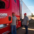 Roehl Transport truck and drivers
