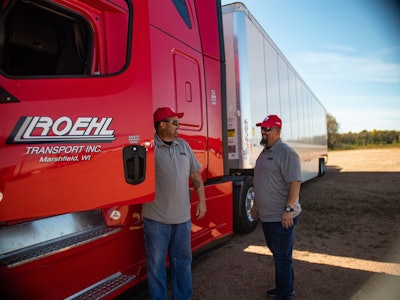 Roehl Transport truck and drivers