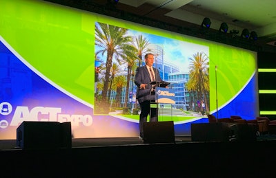 GNA CEO Erik Neandross addresses a packed session at ACT Expo this week at the convention center in Long Beach, Calif. 'We're super fortunate at GNA to work with a lot of the biggest and most progressive fleets that have uber aggressive sustainability programs,' he said.