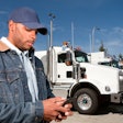 truck driver using his phone