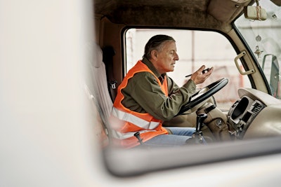 truck driver on his phone