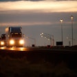 semi truck headlights on the highway
