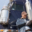Truck driver using a laptop