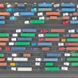 aerial shot of semi-trucks hauling containers