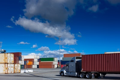 truck hauling containers