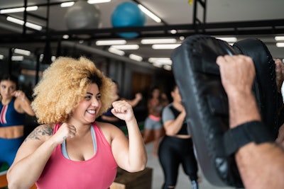 Woman taking a self defense class