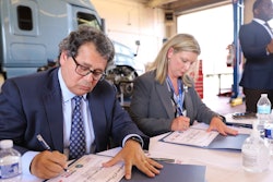 Four Star Freightliner Dealer Principal Jerry Kocan and Ingram President Annette Funderburk.