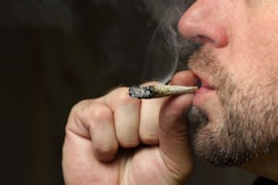 man smoking marijuana
