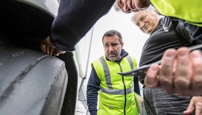 Michelin technicians performing a tire check