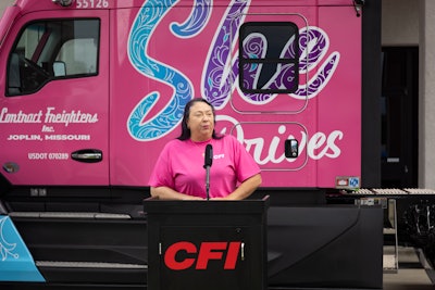 CFI truck driver Penny Thomas with specially wrapped truck