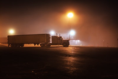semi-truck parked at night