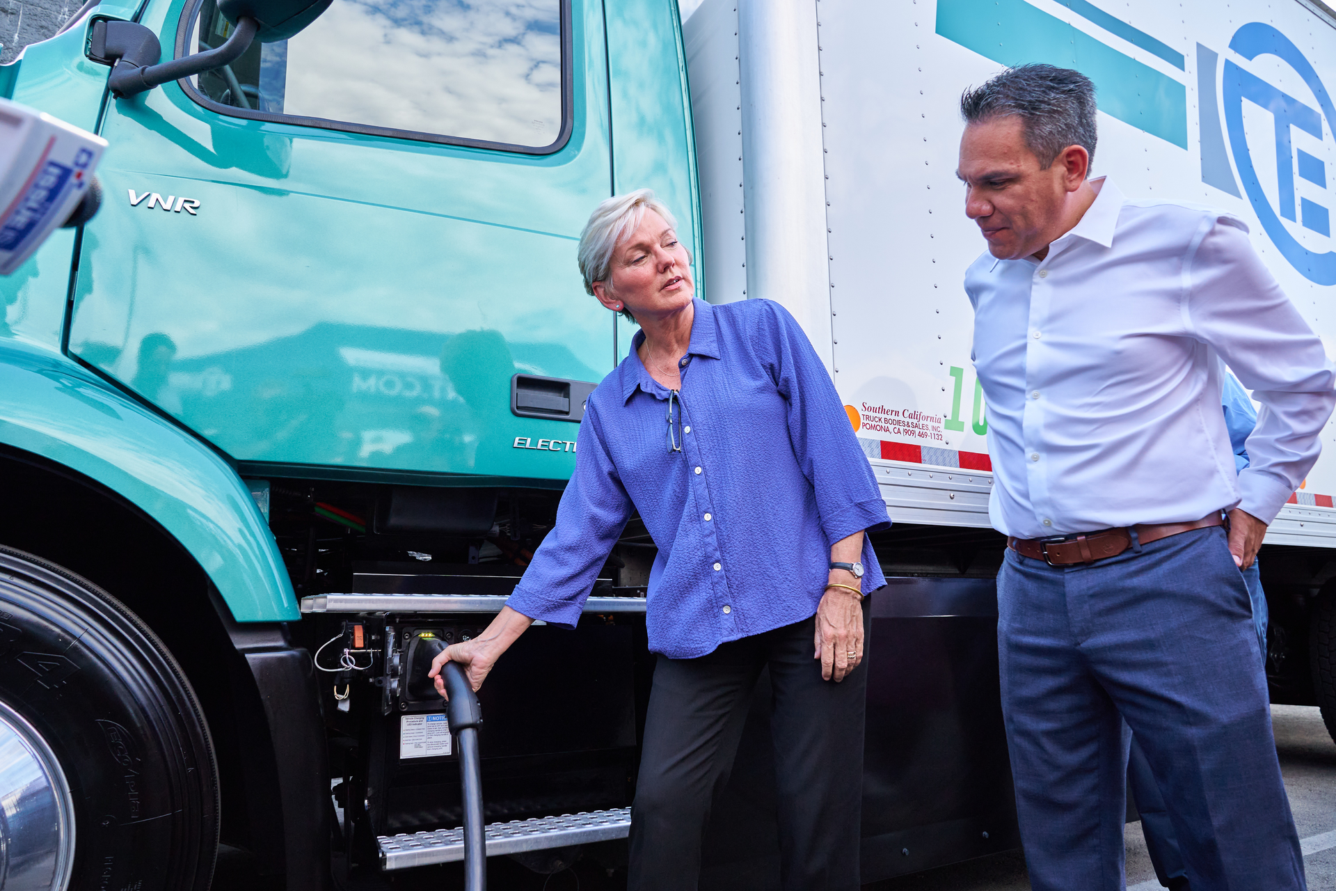 Energy Secretary Granholm and Rep. Aguilar with Volvo VNR Electric