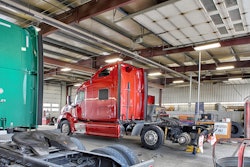 Trucks in a maintenance bay