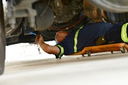 Amerit technician working under a truck