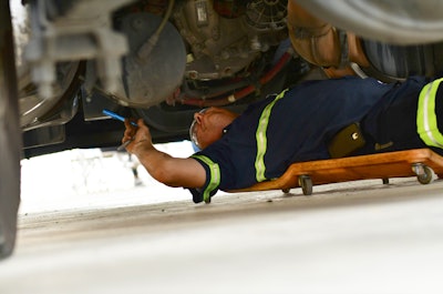 Amerit technician working under a truck