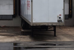 trailer parked at a warehouse dock