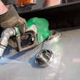 driver filling up a diesel fuel tank