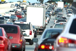 trucks and cars in traffic