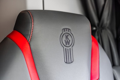 Kenworth logo stitched into a seat