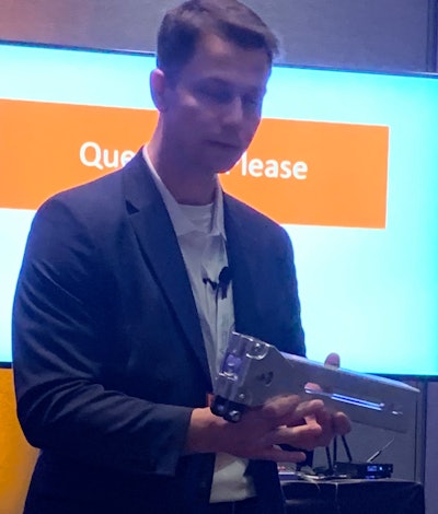 Steve Downing, product manager of Deck Systems for Doleco USA, demonstrates ConnectedDeck System the company debuted at the TMC Annual Meeting and Expo in Orlando Sunday.